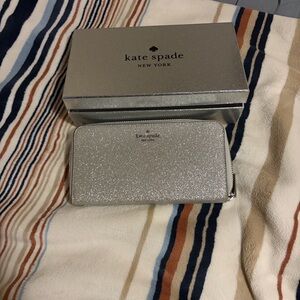 kate spade Silver Glitter Zip-Around Wallet with Logo